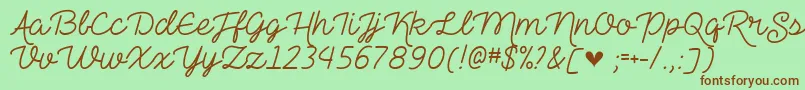 Шрифт TheHeartMazeDemo – коричневые шрифты на зелёном фоне