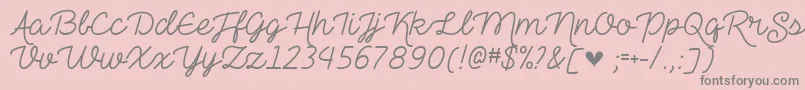 TheHeartMazeDemo-Schriftart – Graue Schriften auf rosa Hintergrund