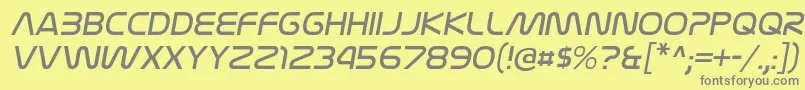 フォントNasalizationltItalic – 黄色の背景に灰色の文字