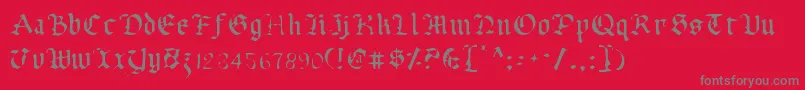 フォントUberv2l – 赤い背景に灰色の文字