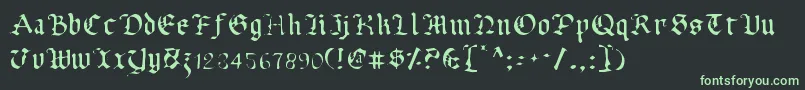 フォントUberv2l – 黒い背景に緑の文字