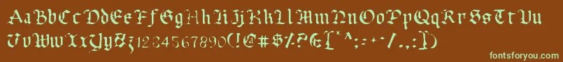 フォントUberv2l – 緑色の文字が茶色の背景にあります。