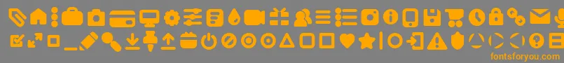 フォントAristaProIconsBoldTrial – オレンジの文字は灰色の背景にあります。