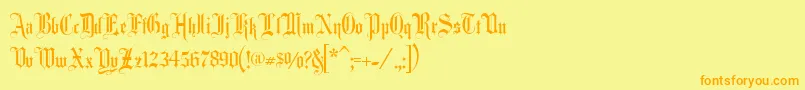 フォントFancycardtext – オレンジの文字が黄色の背景にあります。
