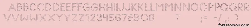 Fonte GlyphStitch – fontes pretas em um fundo rosa