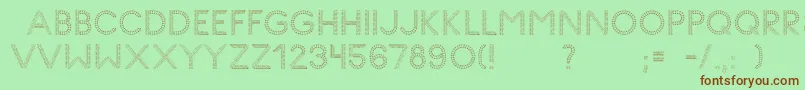 GlyphStitch Font – Brown Fonts on Green Background