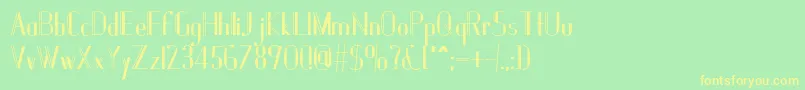 フォントJanesville51B – 黄色の文字が緑の背景にあります