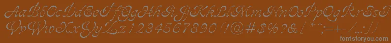 フォントAjile – 茶色の背景に灰色の文字