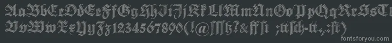 フォントDszierschrift – 黒い背景に灰色の文字