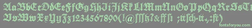 Dszierschrift-Schriftart – Grüne Schriften auf grauem Hintergrund