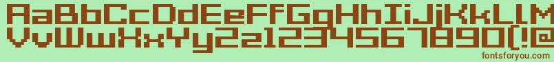 GrixelAcme7WideBold-fontti – ruskeat fontit vihreällä taustalla