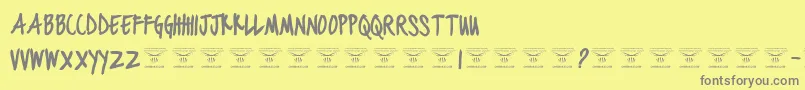 BlackjacketboysBold-Schriftart – Graue Schriften auf gelbem Hintergrund