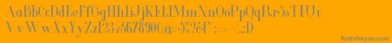 GlamorCondensed-Schriftart – Graue Schriften auf orangefarbenem Hintergrund