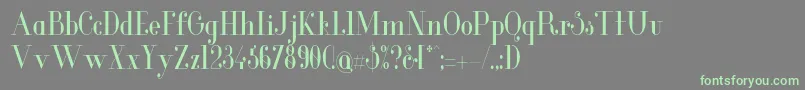 GlamorCondensed-Schriftart – Grüne Schriften auf grauem Hintergrund