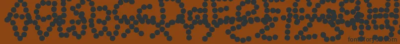 フォントBeadNecklace – 黒い文字が茶色の背景にあります