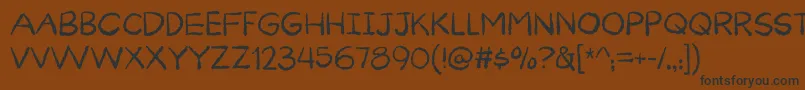 Шрифт CuriousnessDemo – чёрные шрифты на коричневом фоне