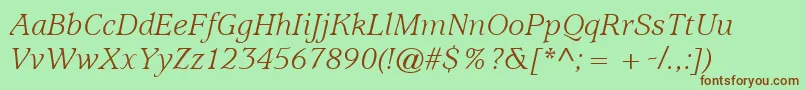 ItcUsherwoodLtBookItalic-fontti – ruskeat fontit vihreällä taustalla