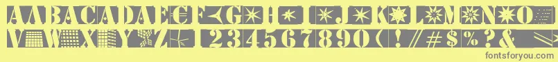 Czcionka Stencilbricksmk – szare czcionki na żółtym tle