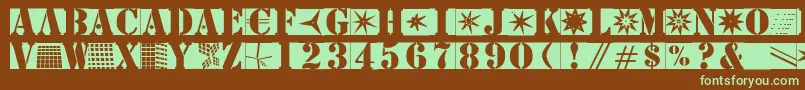 フォントStencilbricksmk – 緑色の文字が茶色の背景にあります。