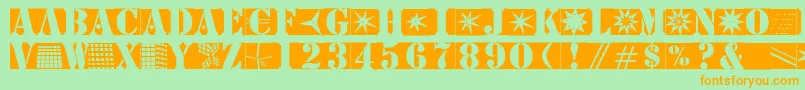 フォントStencilbricksmk – オレンジの文字が緑の背景にあります。