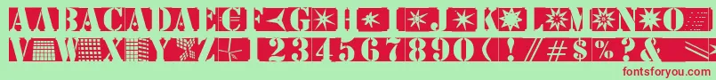 Stencilbricksmk-Schriftart – Rote Schriften auf grünem Hintergrund