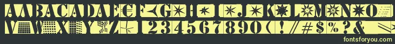 Stencilbricksmk-fontti – keltaiset fontit mustalla taustalla