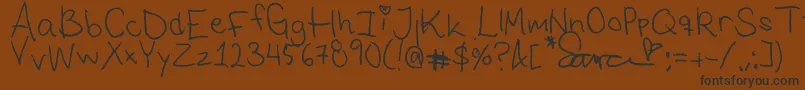 SarasFont1 Font – Black Fonts on Brown Background