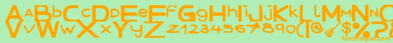 DecemberHandmade Font – Orange Fonts on Green Background