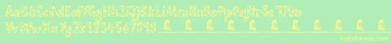 フォントCutiePie – 黄色の文字が緑の背景にあります