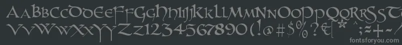 Unzialish-Schriftart – Graue Schriften auf schwarzem Hintergrund