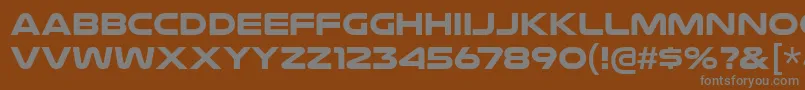 NulshockBd Font – Gray Fonts on Brown Background