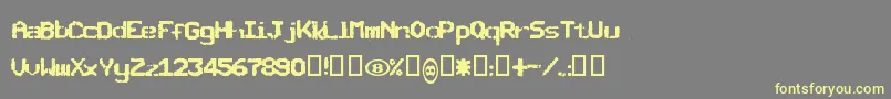 Шрифт Sncbisho – жёлтые шрифты на сером фоне