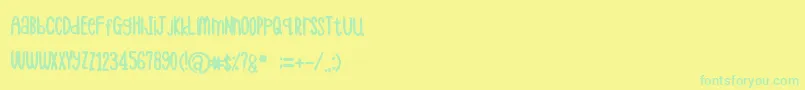 Czcionka Hellogiraffe – zielone czcionki na żółtym tle