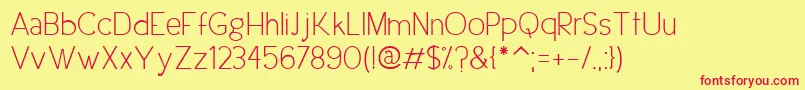 UrbanEleganceRegular-Schriftart – Rote Schriften auf gelbem Hintergrund