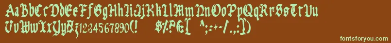 フォントUberhГ¶lmeCondensed – 緑色の文字が茶色の背景にあります。