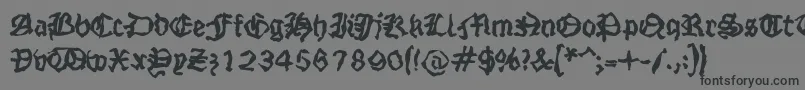 フォントStrangeblackletter – 黒い文字の灰色の背景