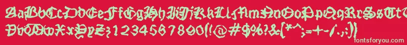 フォントStrangeblackletter – 赤い背景に緑の文字