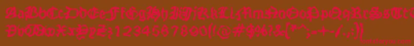 Strangeblackletter Font – Red Fonts on Brown Background