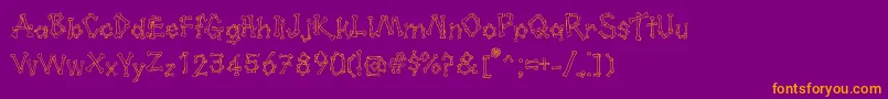 Kavernosa Font – Orange Fonts on Purple Background