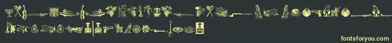 CornucopiaOfDingbatsSix Font – Yellow Fonts on Black Background