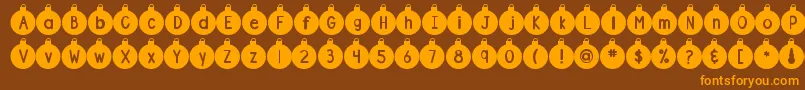 Fonte DjbOrnamental – fontes laranjas em um fundo marrom