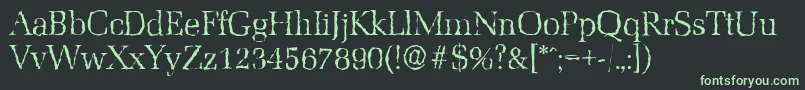 Czcionka MarseillerandomLightRegular – zielone czcionki na czarnym tle