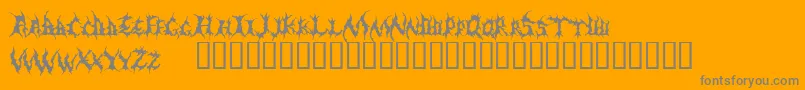 Demed-fontti – harmaat kirjasimet oranssilla taustalla