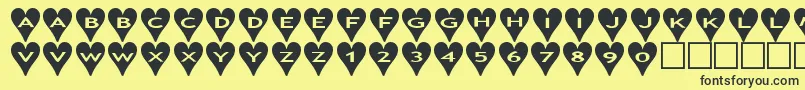 Ashearts Font – Black Fonts on Yellow Background