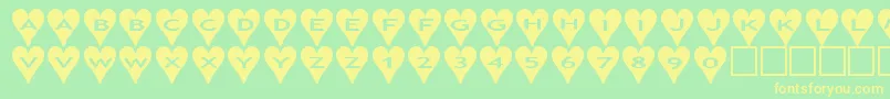 Ashearts Font – Yellow Fonts on Green Background
