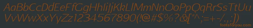 Шрифт AftasansthinItalic – коричневые шрифты на чёрном фоне