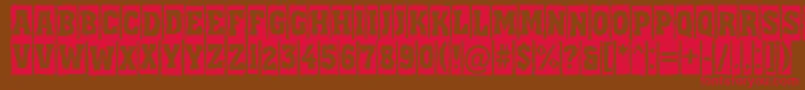 フォントAAssuantitulcmbrk – 赤い文字が茶色の背景にあります。