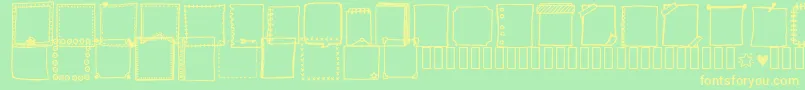 Tanaesteldoodleframes01Regular-fontti – keltaiset fontit vihreällä taustalla