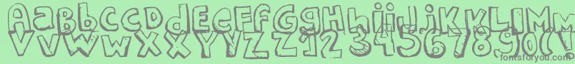 フォントStarguides – 緑の背景に灰色の文字