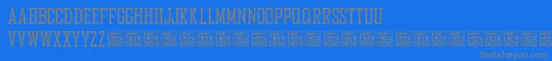 HbmBureauTrendDonationware-fontti – harmaat kirjasimet sinisellä taustalla